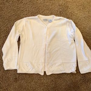Girl’s white sweater